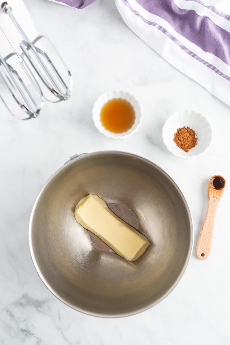 Overhead view of ingredients for maple cinnamon butter.