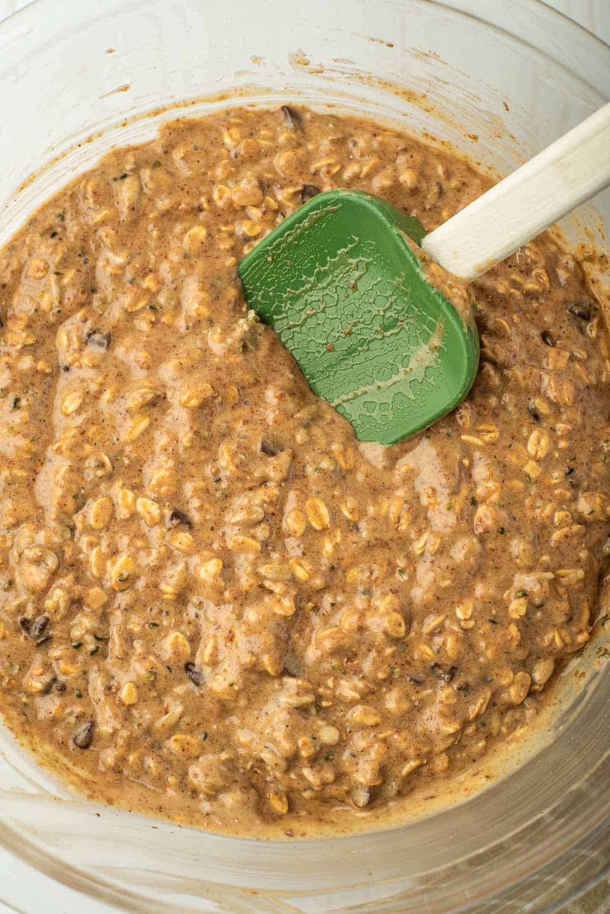 Peanut butter breakfast cookie batter in a glass bowl.