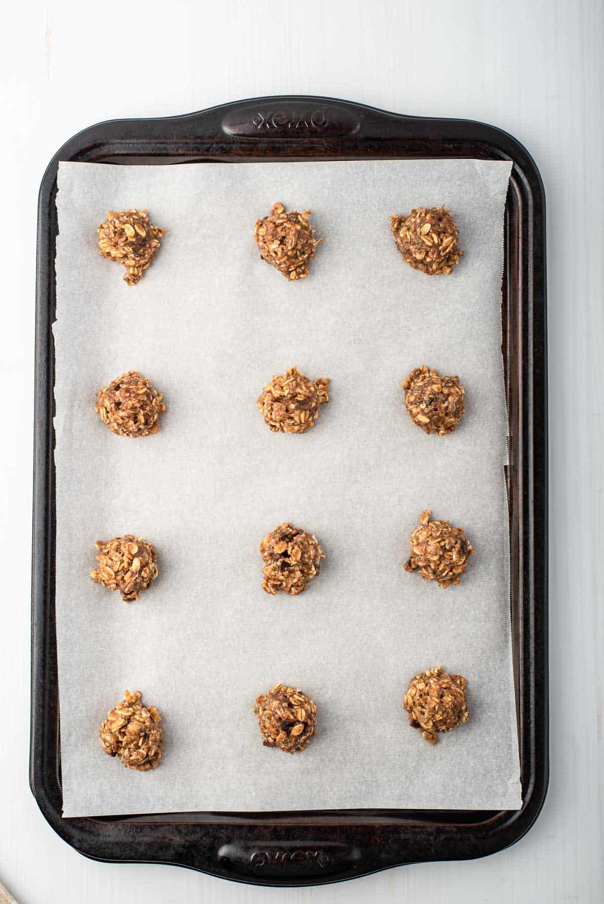 Cookies on a tray, before being baked.