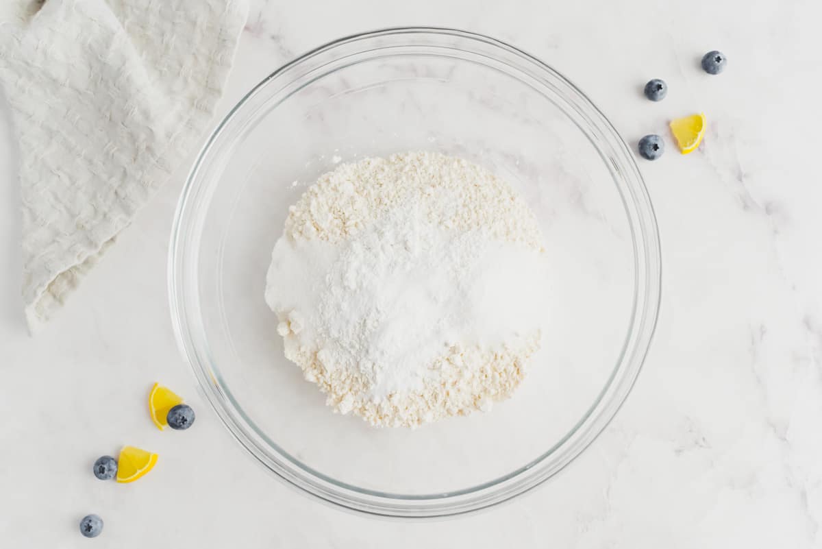 Dry ingredients for lemon blueberry pancakes in a bowl.