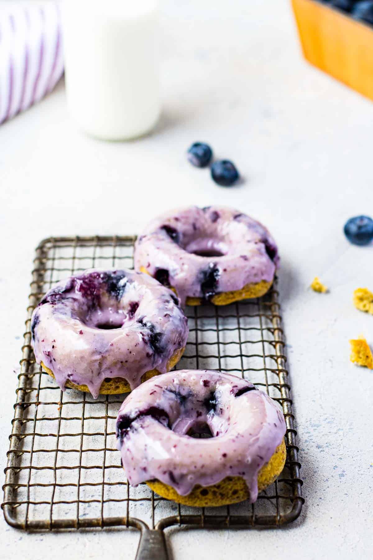 Blueberry donuts with blueberry lemon glaze.