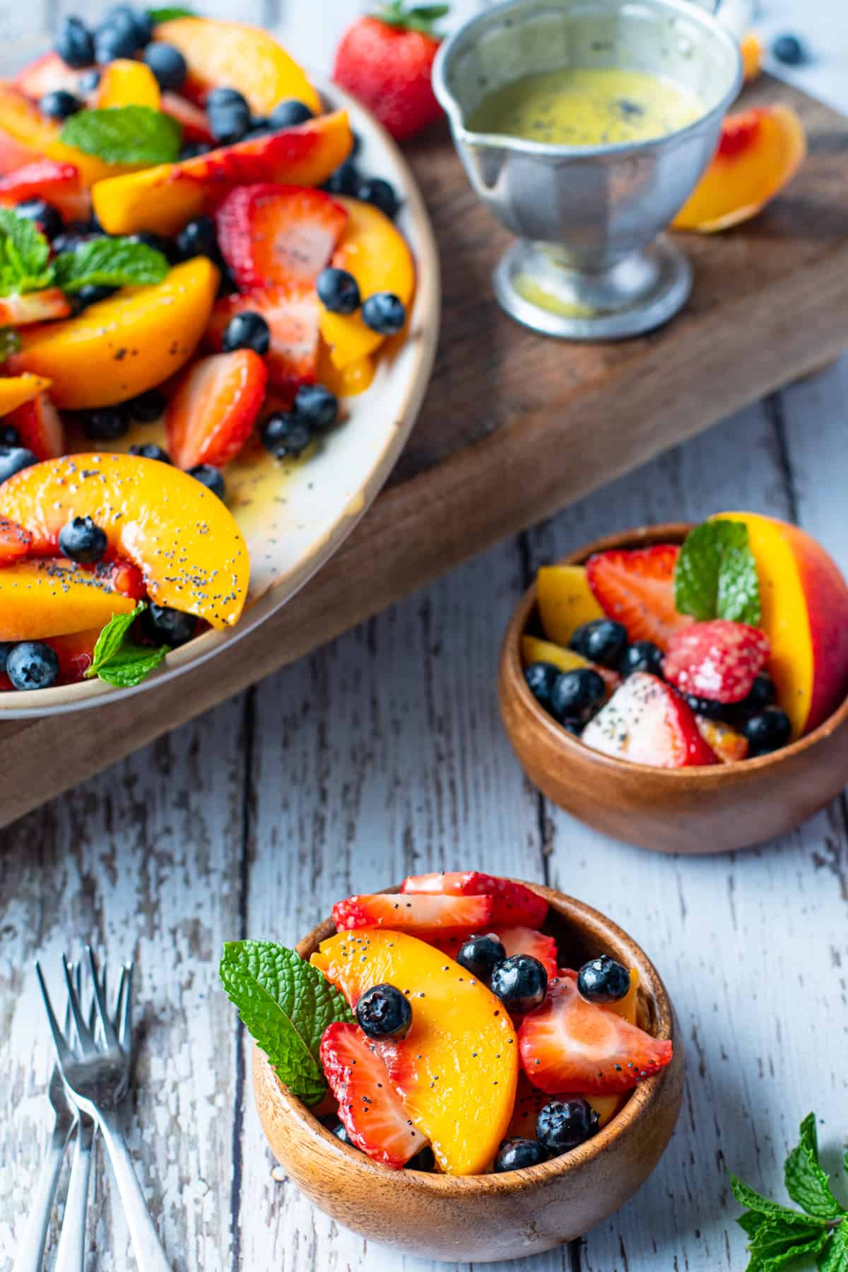 Fruit salad in small separate bowls.
