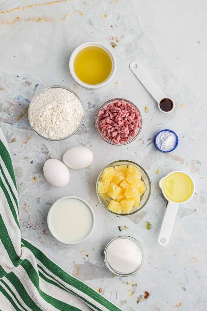 Overhead view of ingredients needed to make sheet pan pancakes with ham and pineapple.