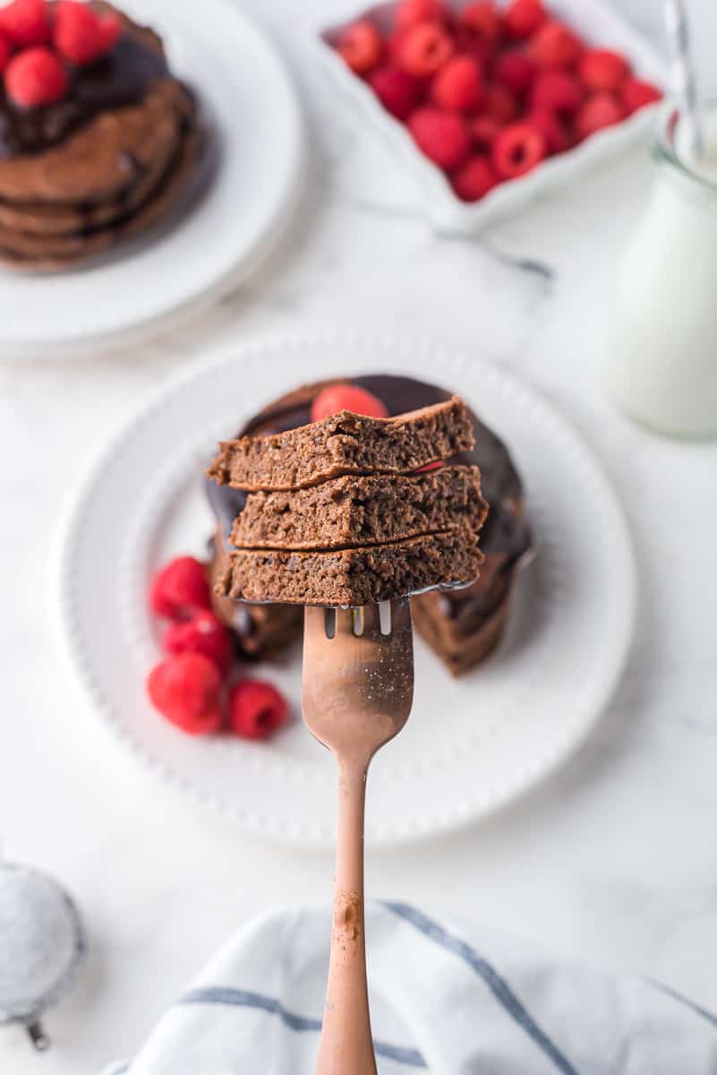 Chocolate pancakes on a fork.