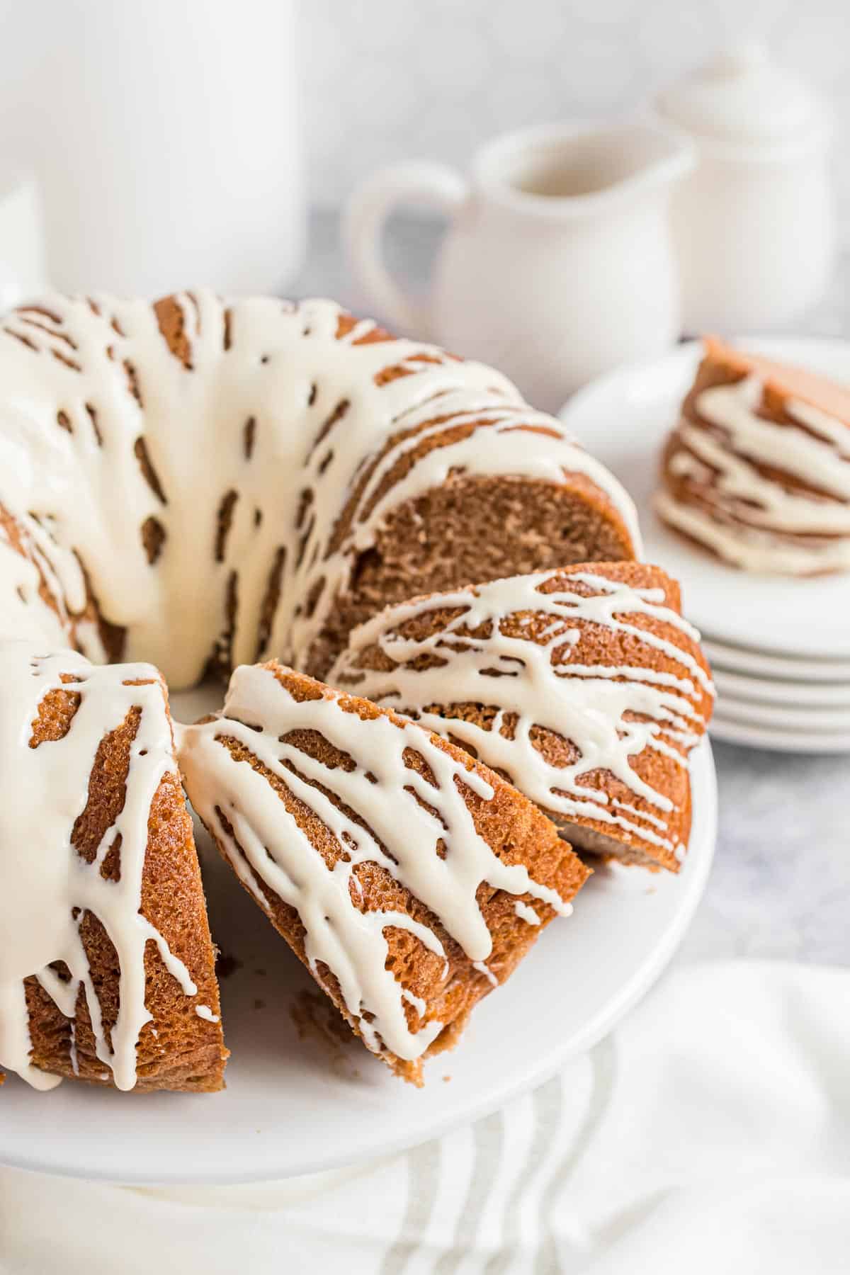 Maple cream cheese glaze on a bundt cake.