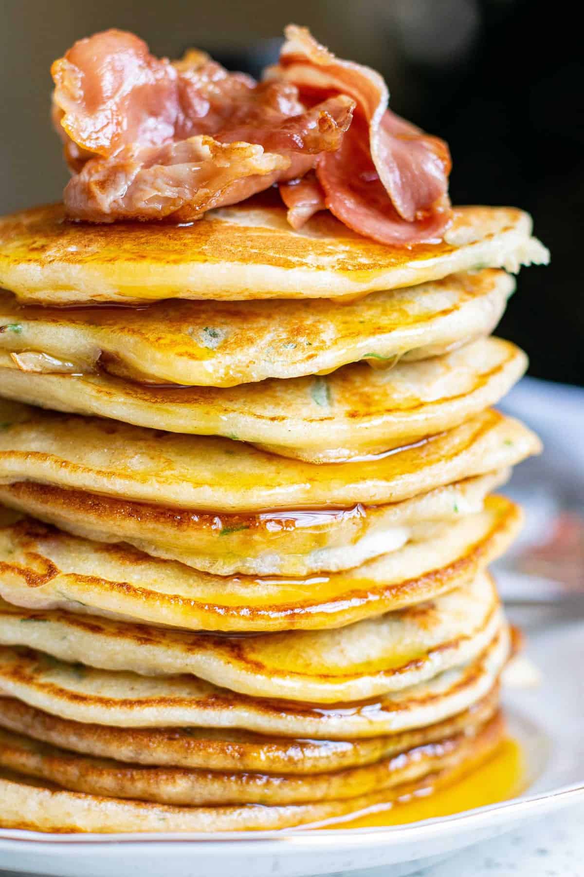 Pancakes topped with bacon.