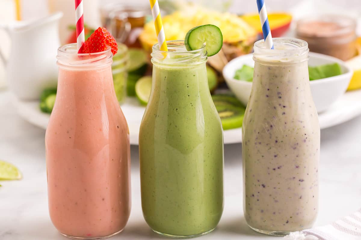 Three smoothies side by side, all with different garnishes.