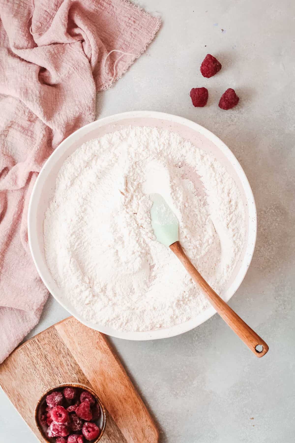 Dry ingredients in a pink bowl.