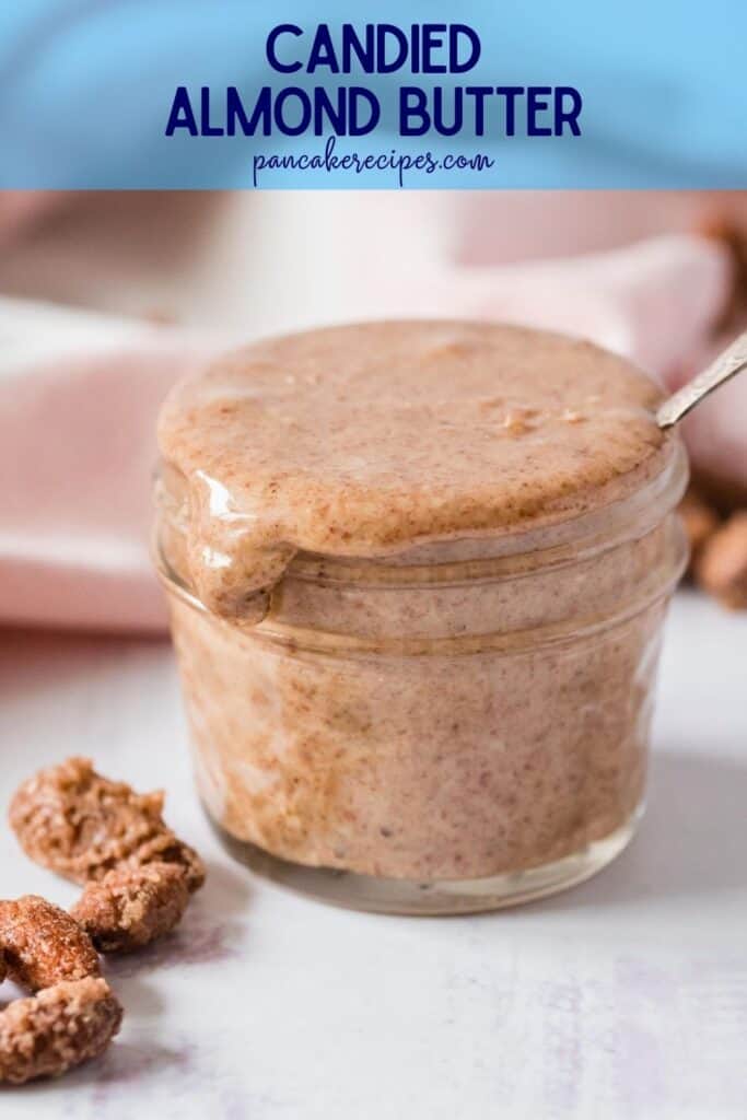 A jar full of light brown spread, text overlay reads "candied almond butter"