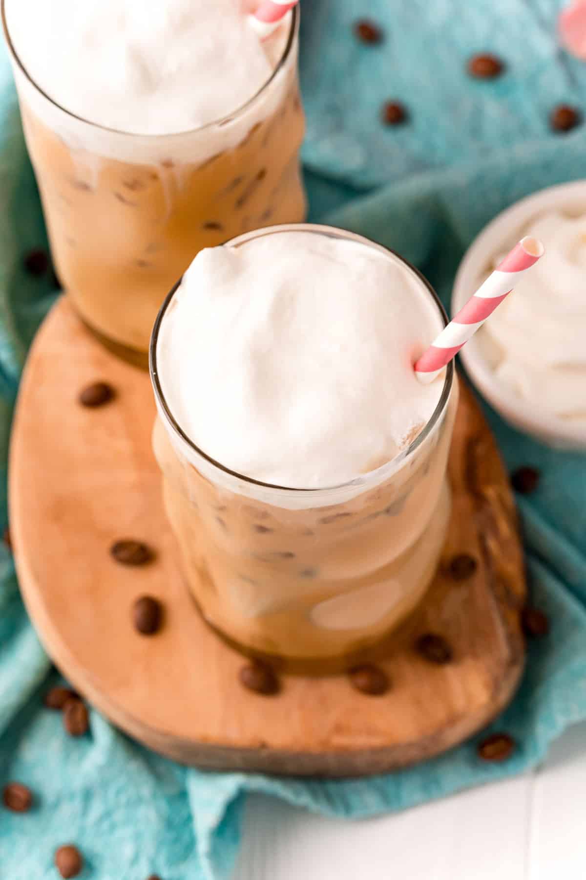 Overhead view of a whipped cream topped iced coffee.