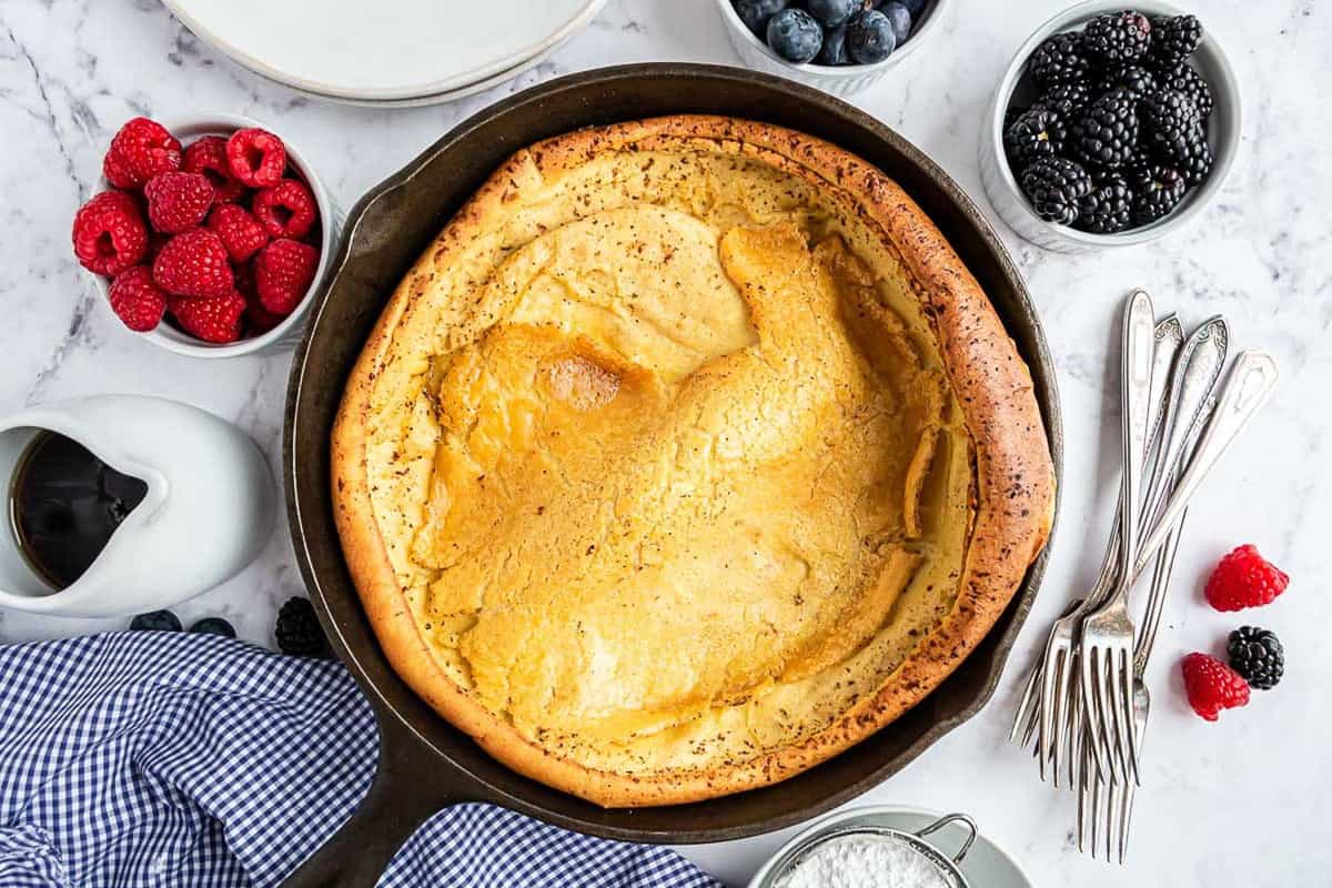 Baked dutch baby in a pan with no toppings.