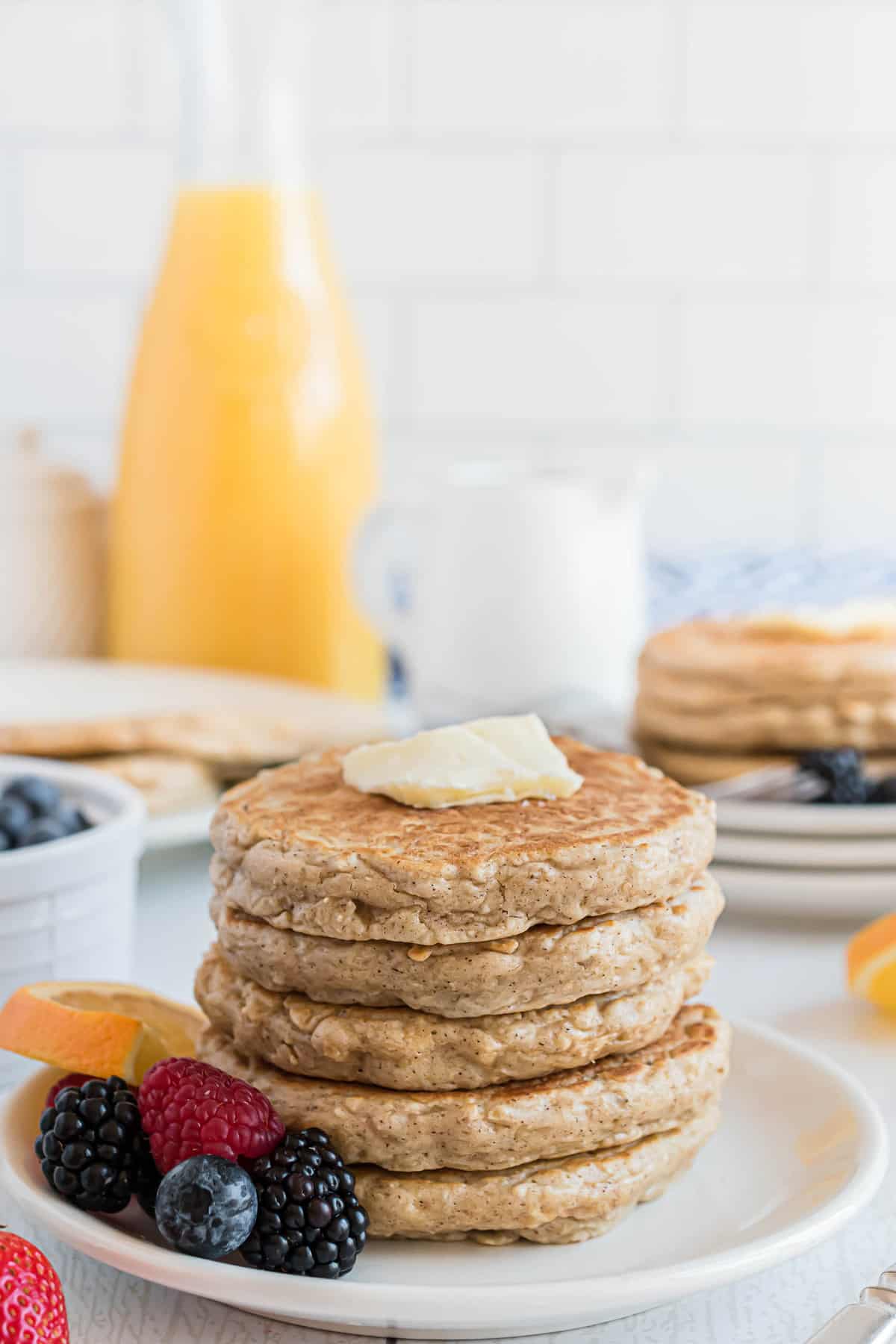 Stack of pancakes with butter.