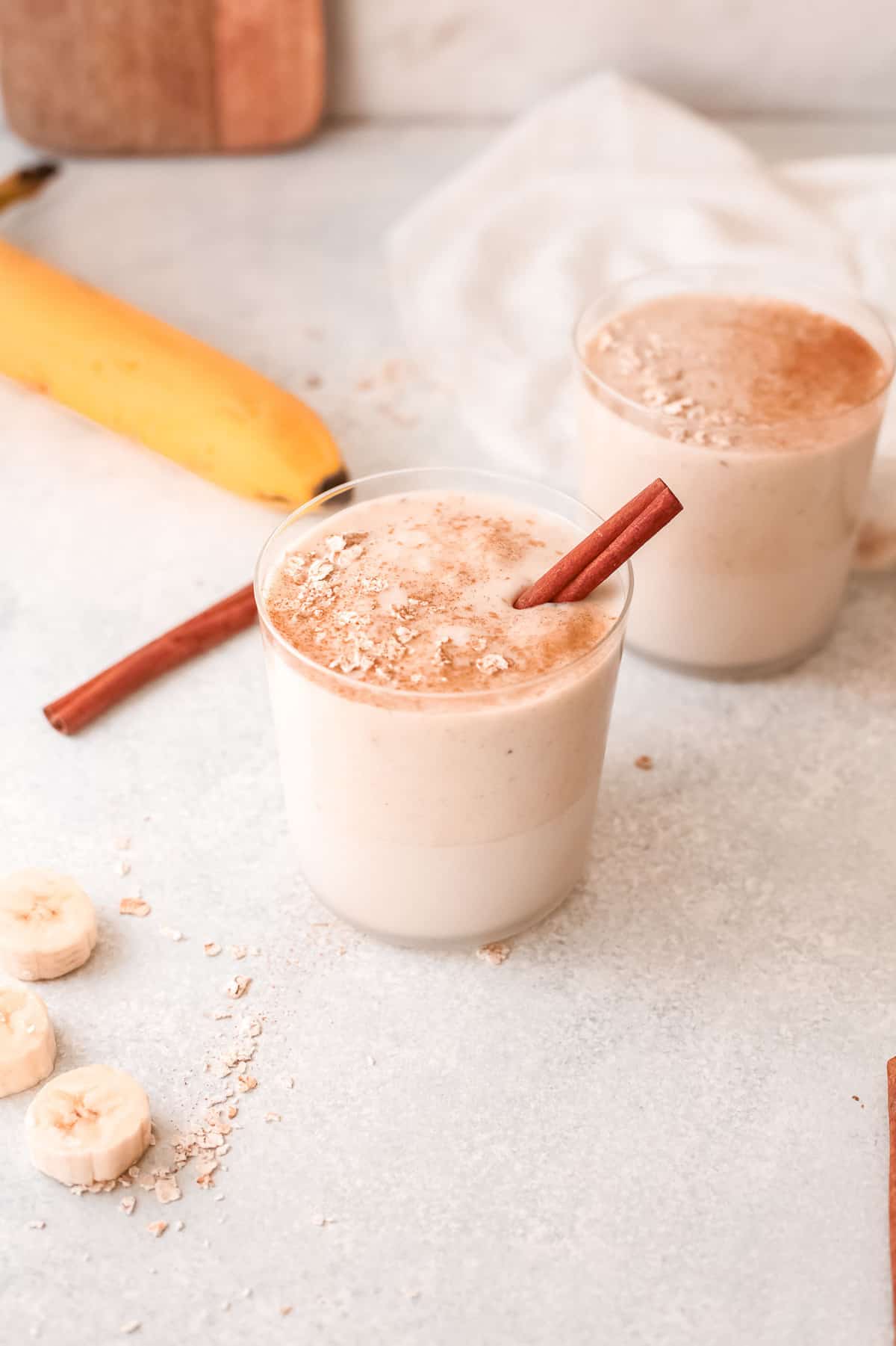 Banana smoothie topped with cinnamon.