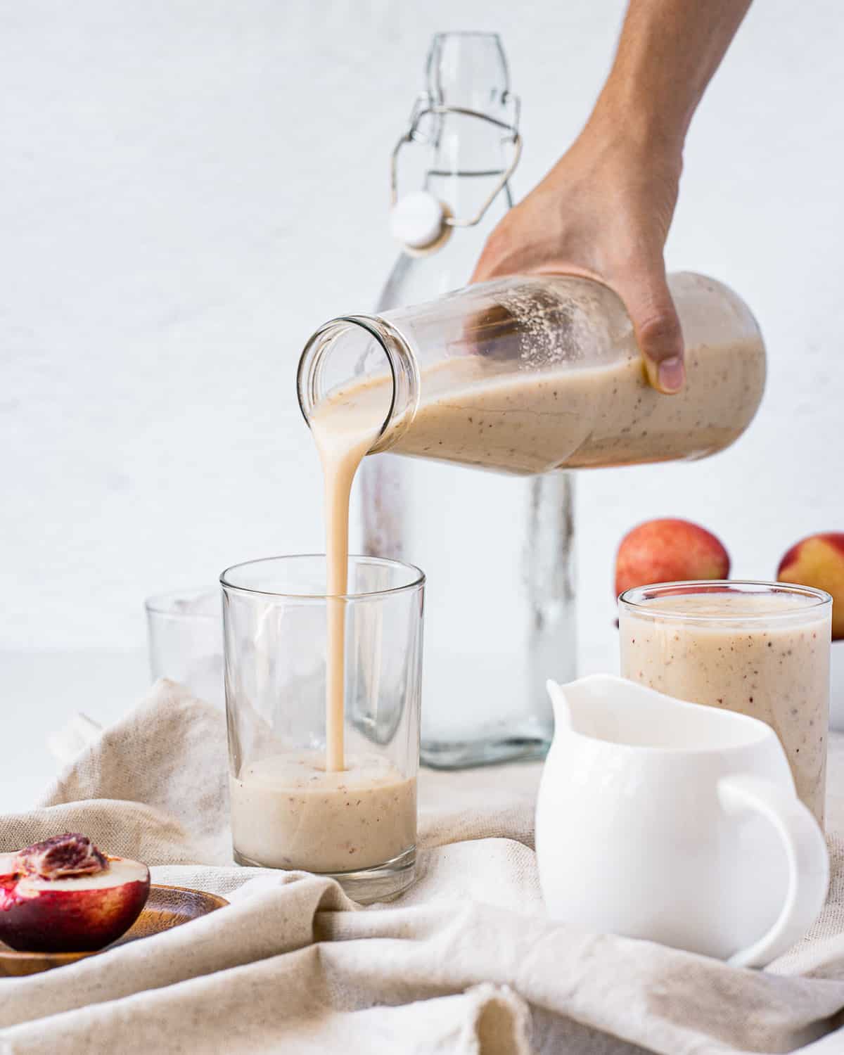 Smoothie being poured into a glass.