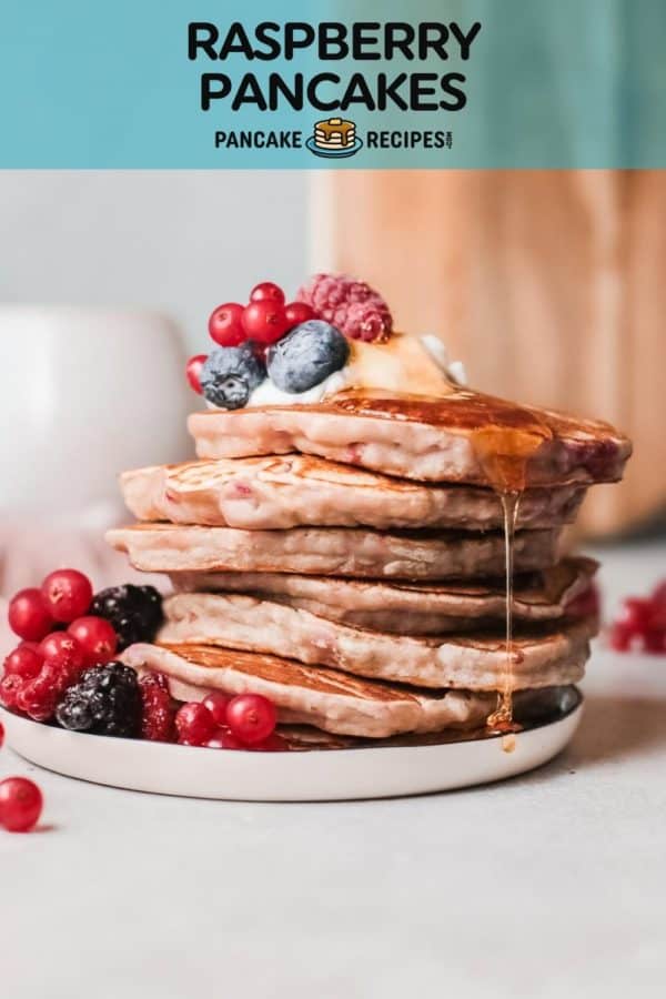 Stack of pancakes, text overlay reads, "raspberry pancakes, pancakerecipes.com"