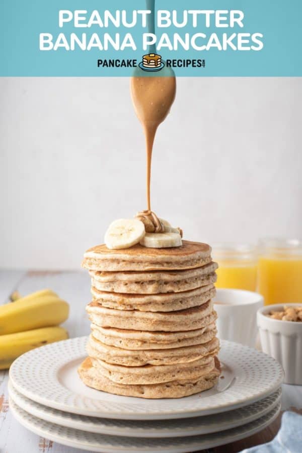 Tall stack of pancakes with a spoon above drizzling peanut butter. Text overlay reads "peanut butter banana pancakes, pancakerecipes.com"