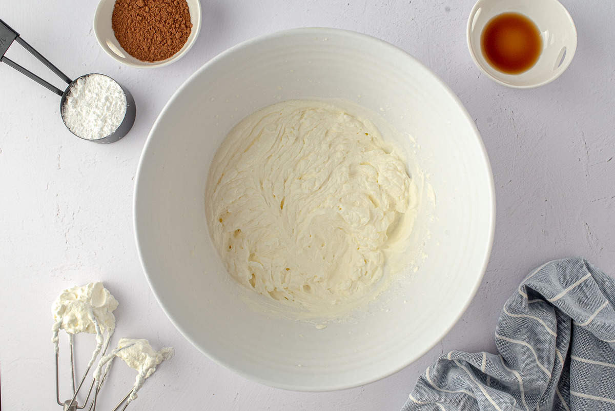 Whipped cream with peaks forming.