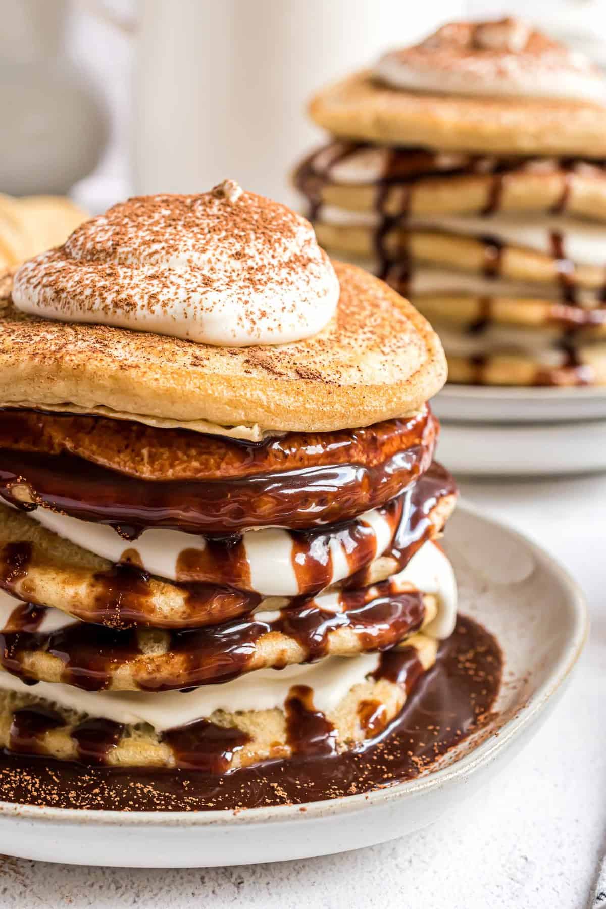 Pancakes layered with mascarpone filling and kahlua syrup.