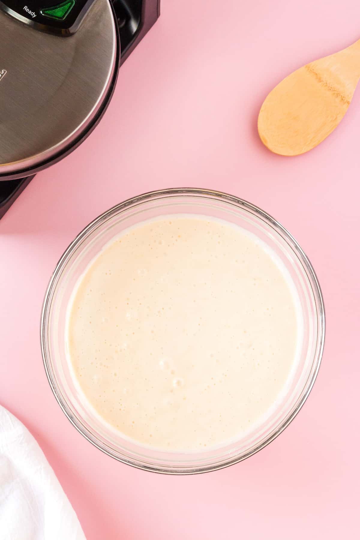 Waffle batter in glass. mixing bowl. 