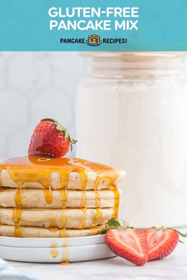 Stack of pancakes with a jar of dry ingredients in the background, text overlay reads "gluten-free pancake mix."