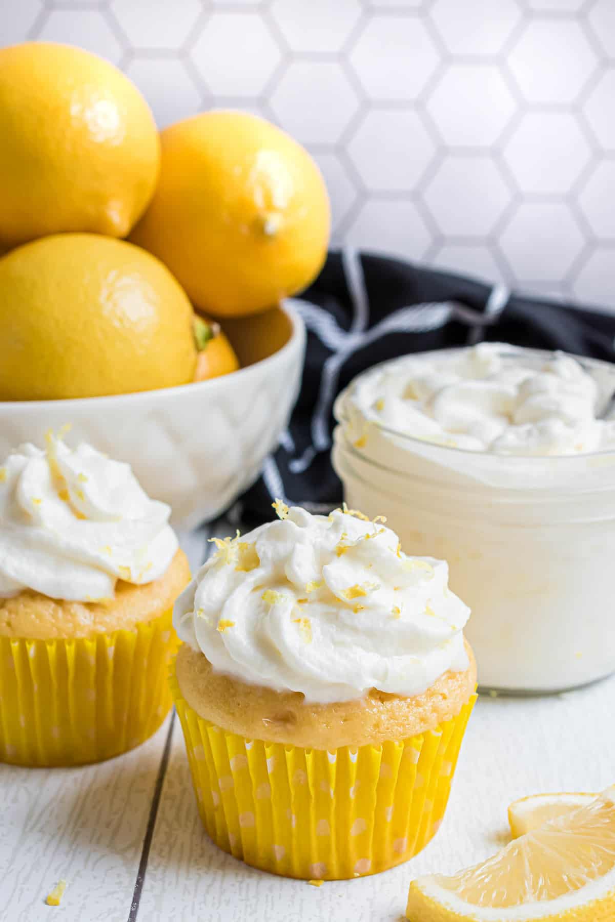 Lemon whipped cream on a cupcake.