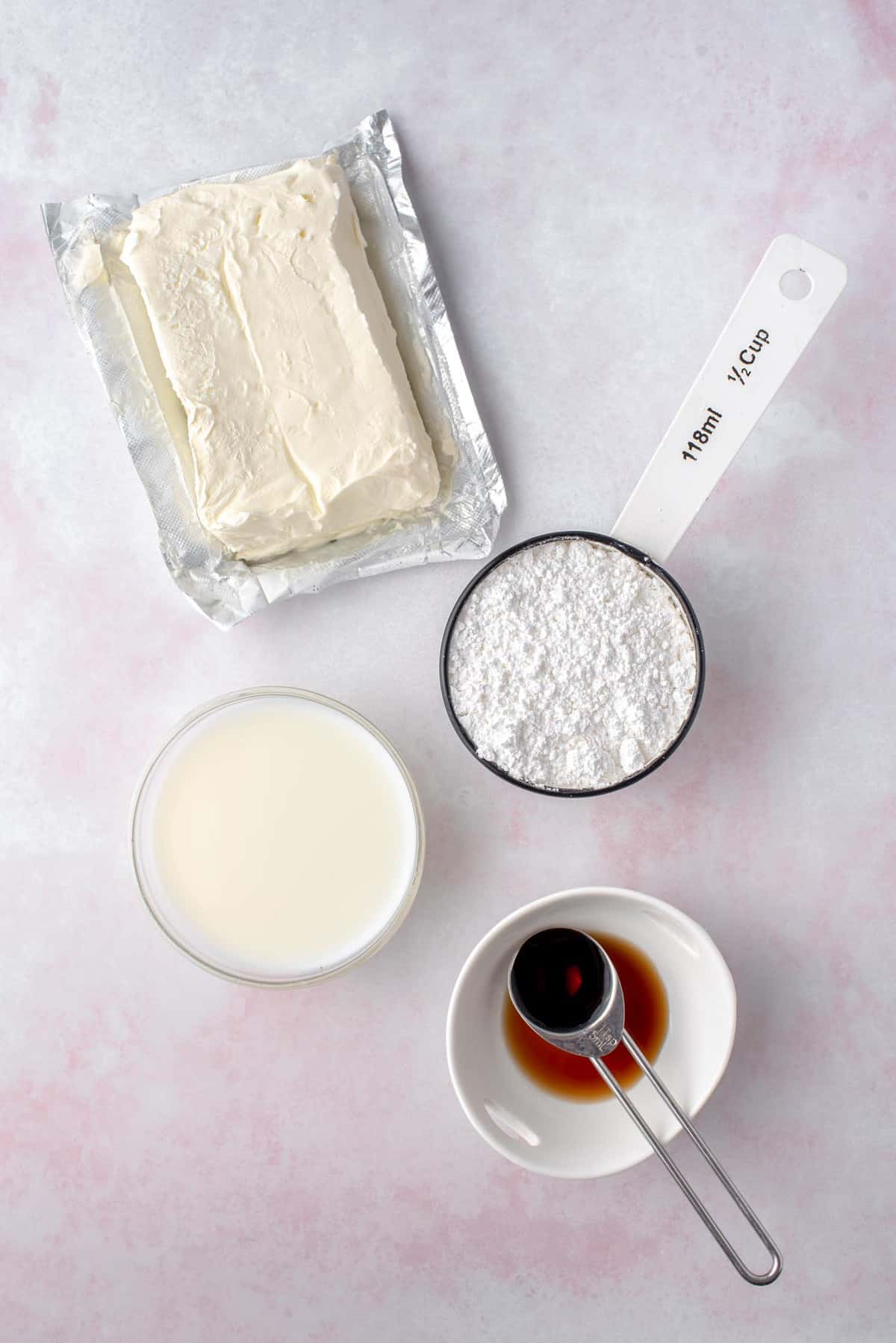 Ingredients needed to make cream cheese glaze.