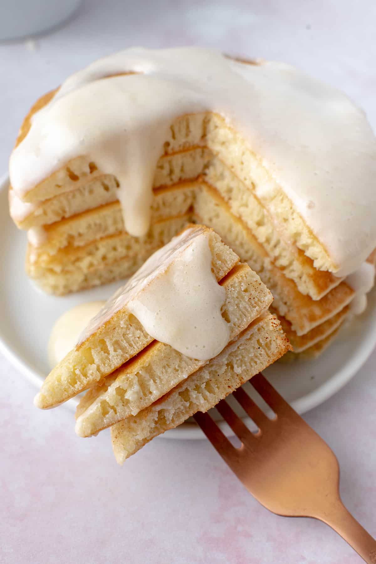 White glaze on a stack of pancakes.