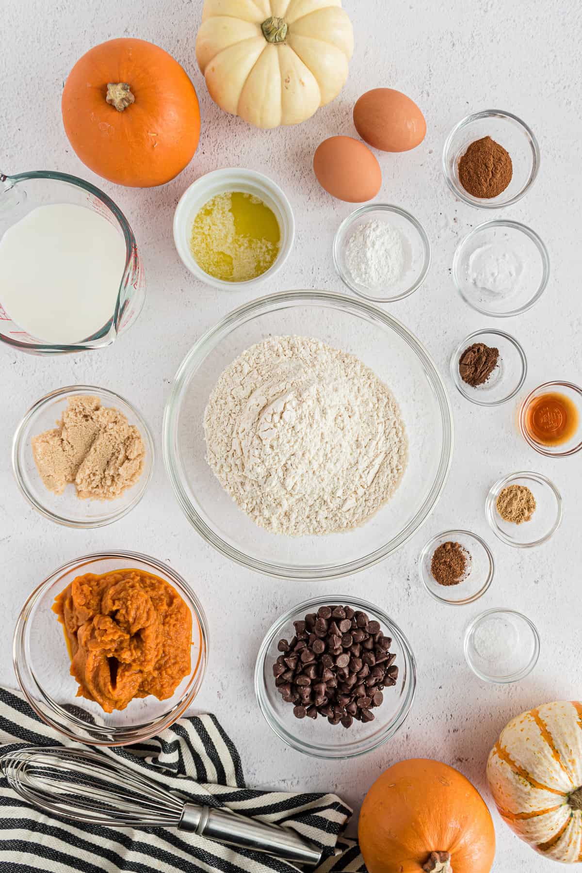 Overhead view of ingredients needed for recipe, including pumpkin puree.