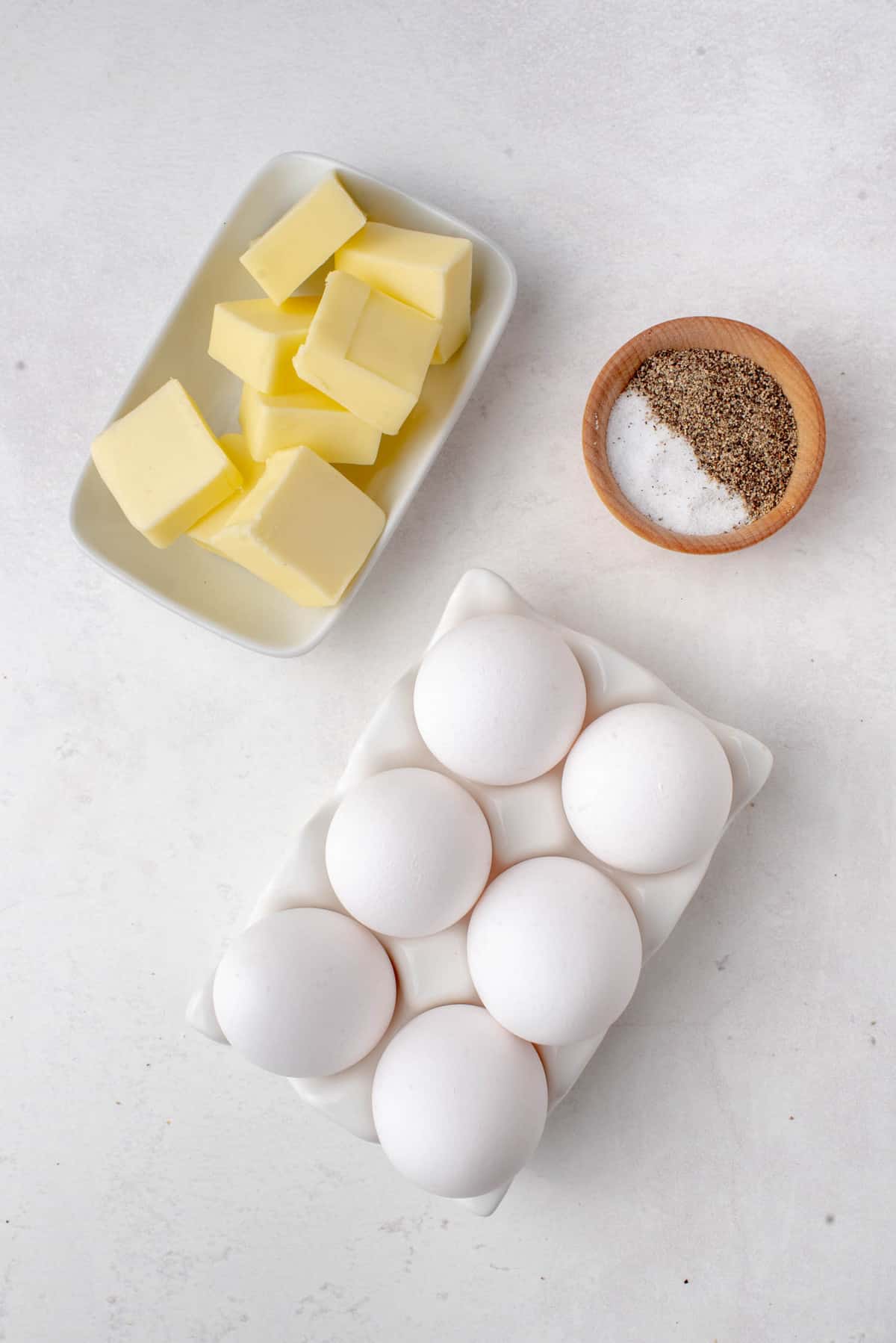 Eggs, butter, salt, and pepper.
