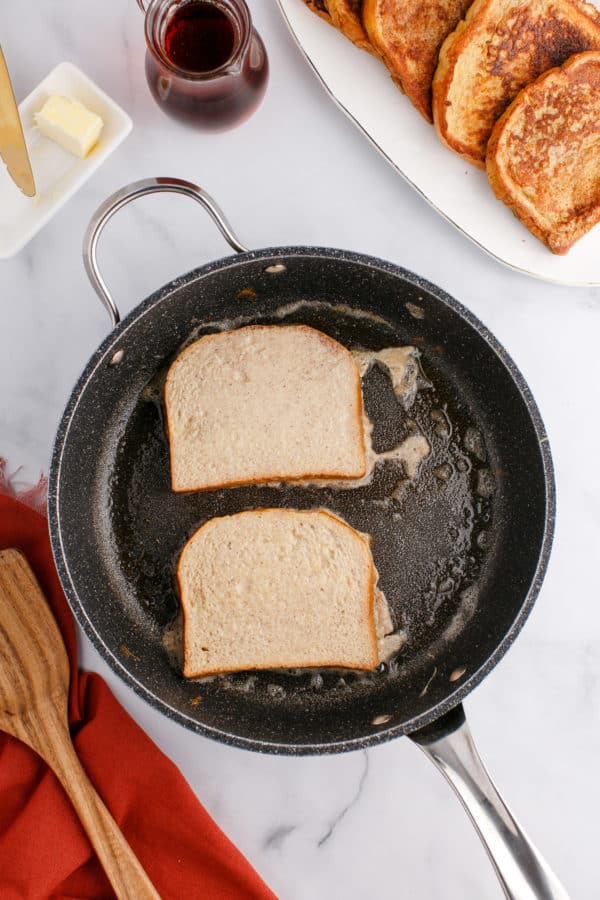 French toast in skillet, not cooked.