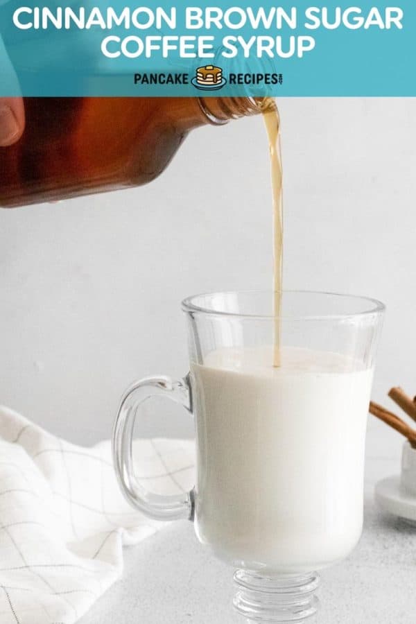 Syrup being poured into a mug of coffee, text overlay reads "cinnamon brown sugar coffee syrup."