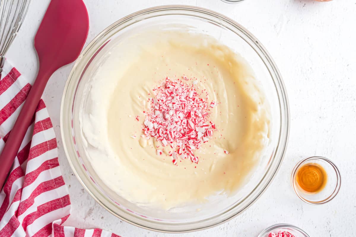 Crushed candy canes on top of pancake batter.