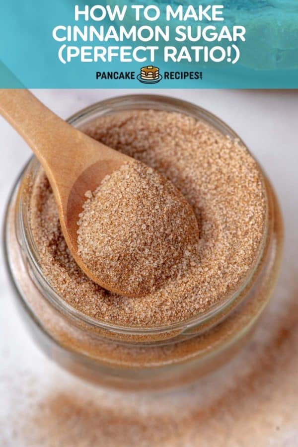 Jar of cinnamon sugar with wooden spoon, text overlay reads "how to make cinnamon sugar - perfect ratio!"