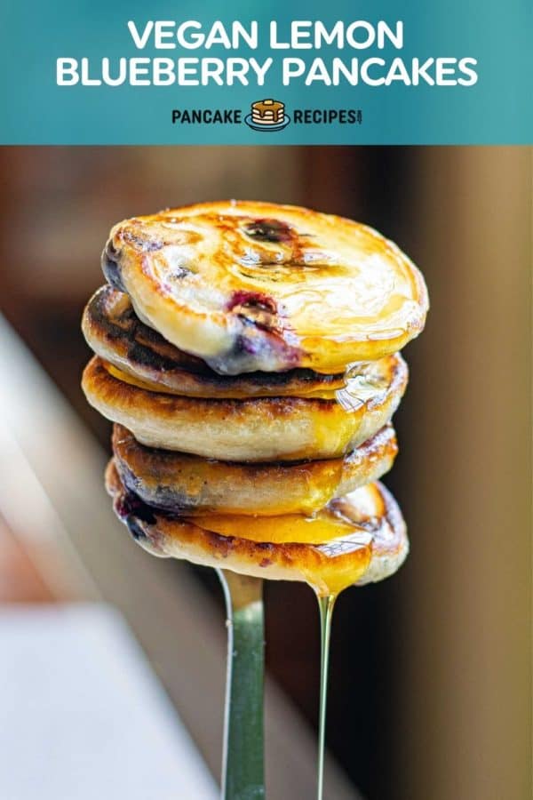 Stack of small pancakes on fork, text overlay reads "vegan lemon blueberry pancakes."