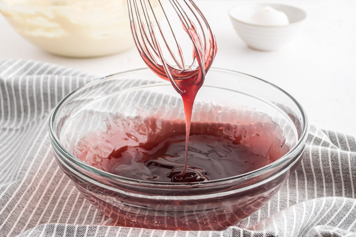 Jelly syrup on a whisk.