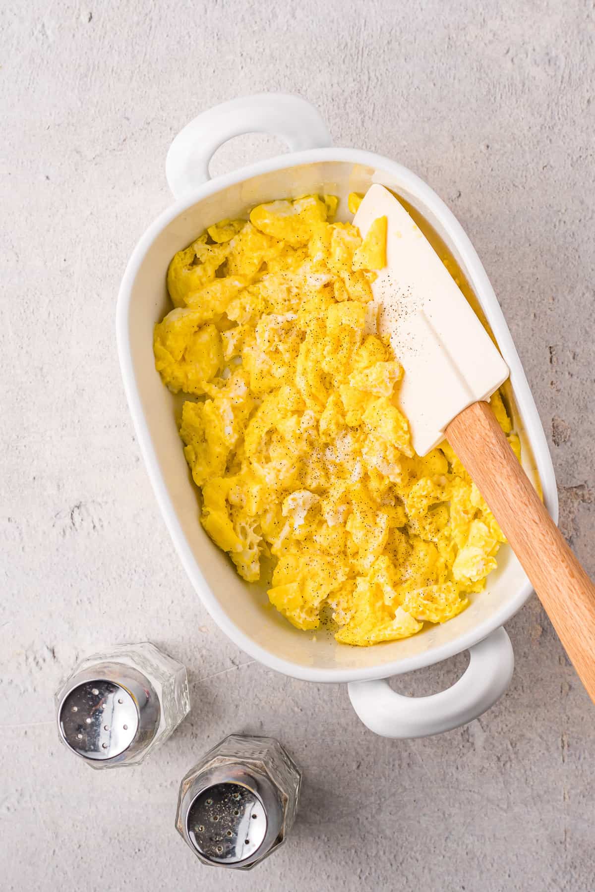 Microwave scrambled eggs in a baking dish.