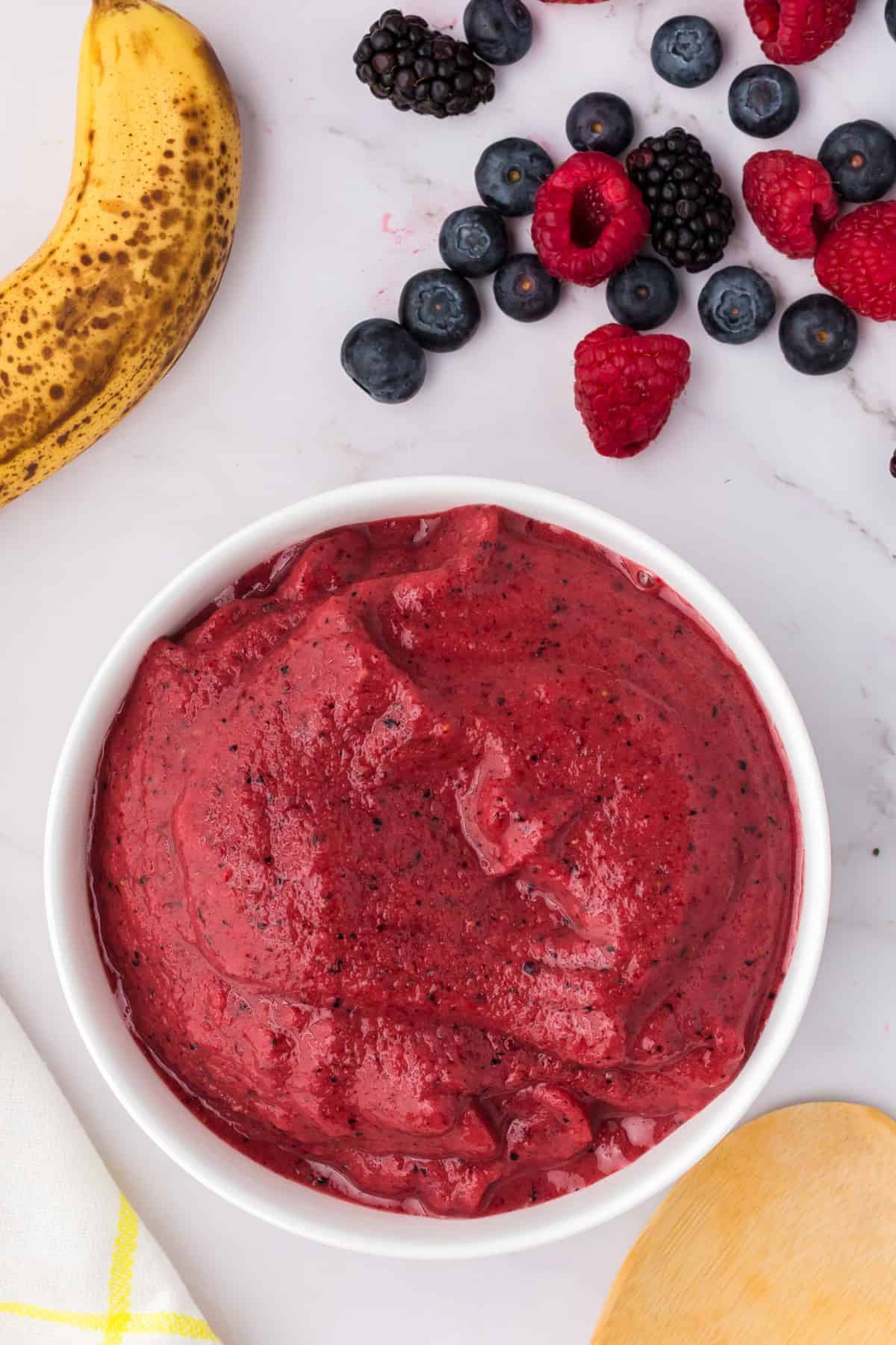 Berry smoothie bowl with no toppings.