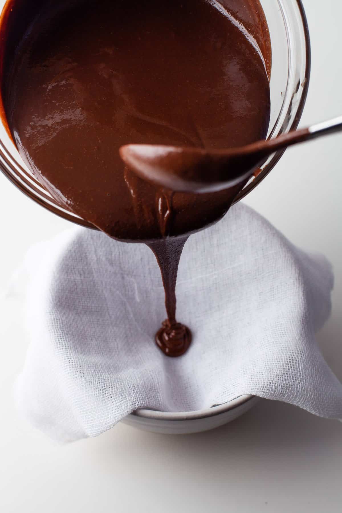 Nutella being poured into a cheesecloth.