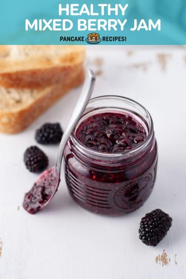 Dark purple jam, text overlay reads "healthy mixed berry jam."
