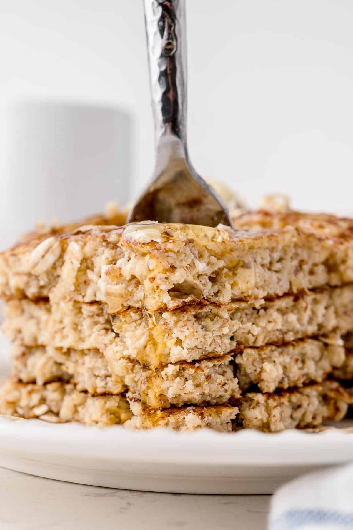 Stack of pancakes, cut to show texture.