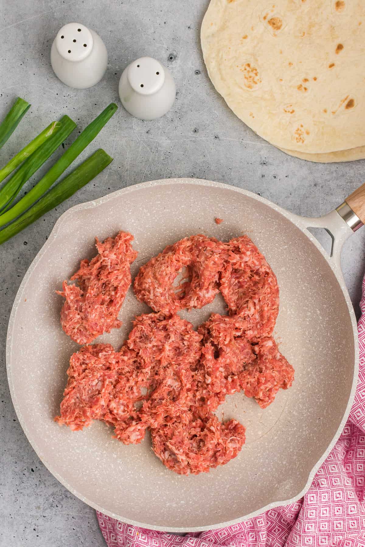 Sausage before and after browning.