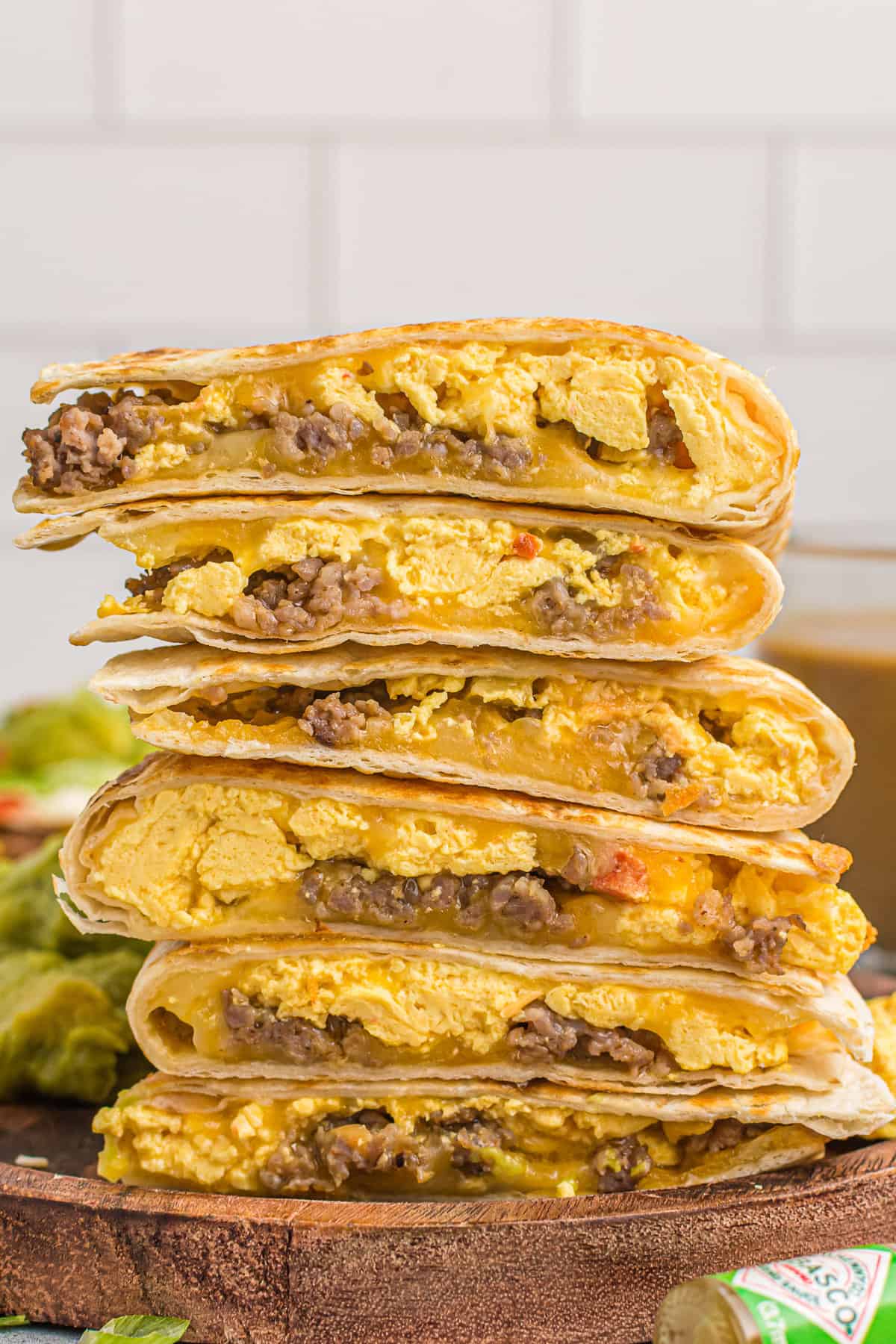 Stack of breakfast quesadilla slices.