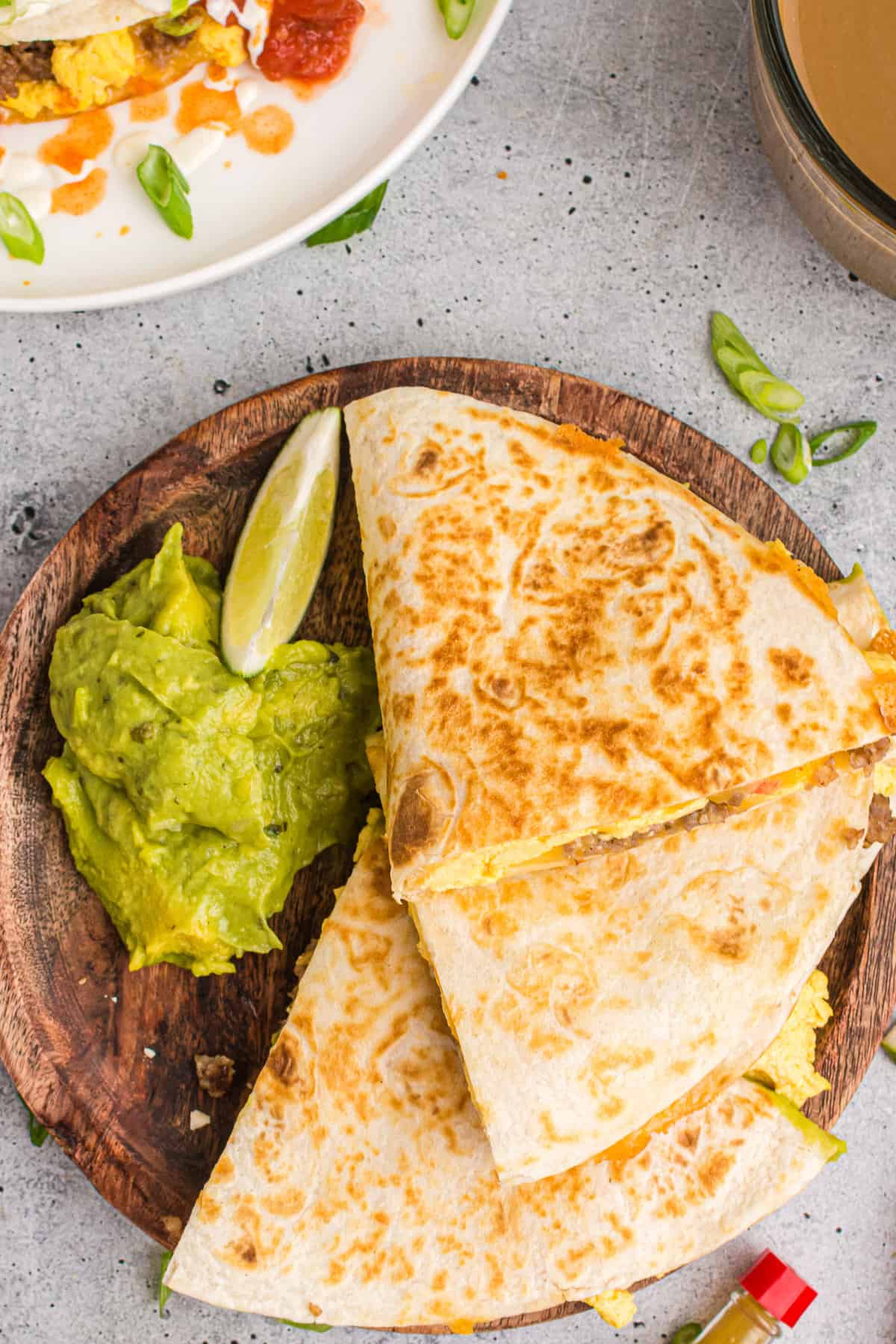 Overhead view of quesadillas, cut into triangles.