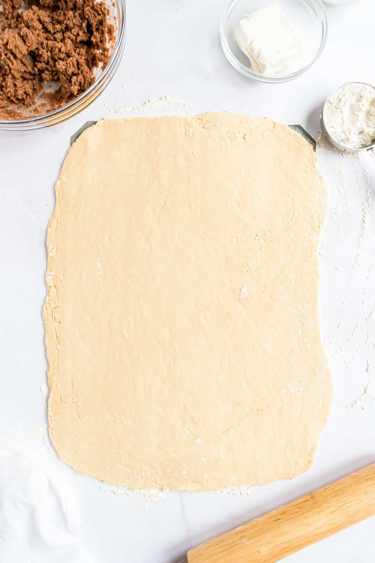 Dough rolled into rectangle.