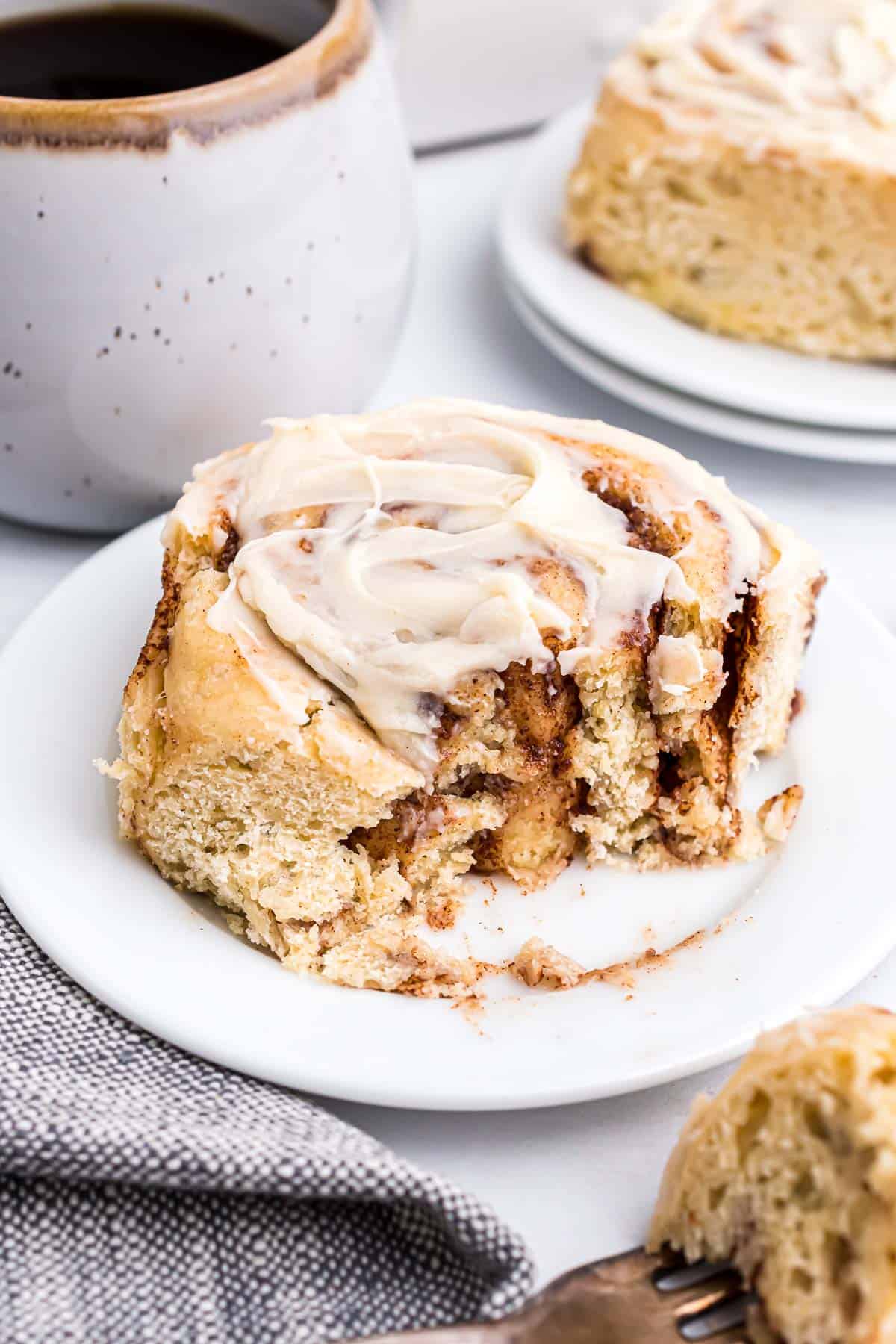 Same-day cinnamon roll, cut to show inner texture.