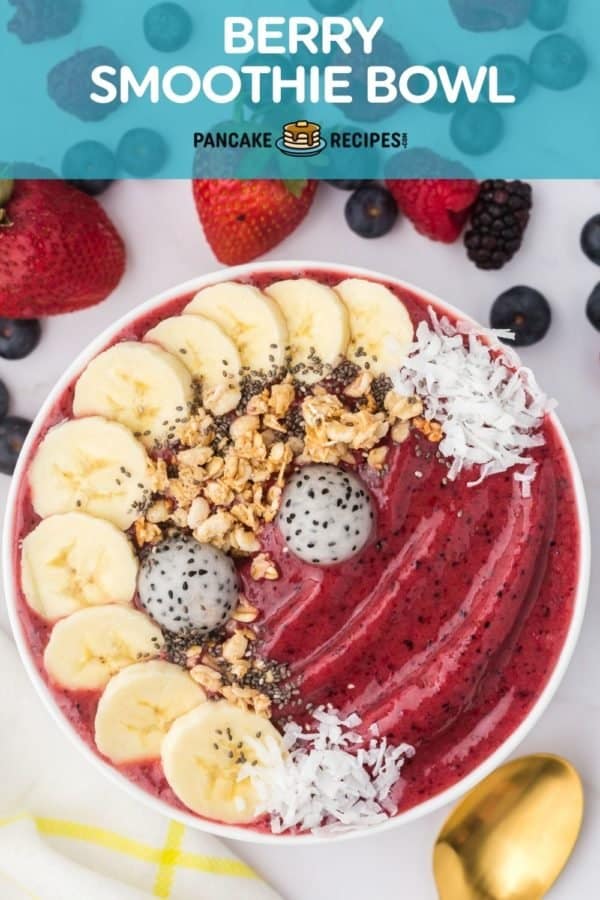 Smoothie bowl with toppings, text overlay reads "berry smoothie bowl."