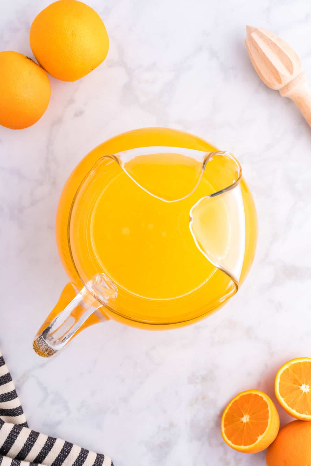 Orangeade in a pitcher.