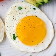 Overhead view of a sunny side up egg.