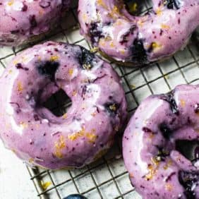 Blueberry cake donuts with blueberry lemon glaze.