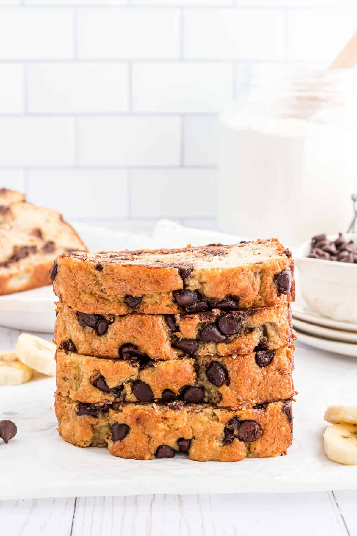 Chocolate chip banana bread slices stacked.
